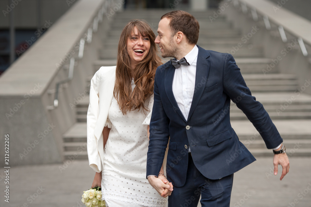 Beautiful newlyweds are very happy. Emotional portrait Beautiful newlyweds are very happy. Emotional portrait