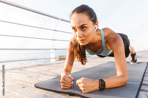 Close up of a confident asian sportswoman photo