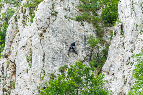 Rock climbing acrobat 