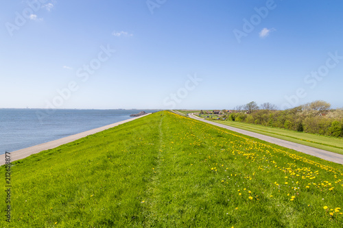 The dykes around Oudeschild on the Waddenisland Texel Nethrlands, protecitng the islland for the sea in the Netherlands photo