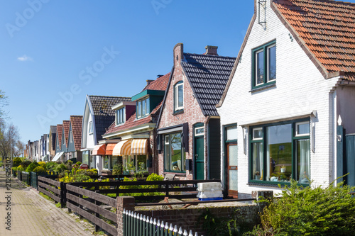 Village Oudeschild with a row of  trraditional fisherman houses on Texel island in the Netherlands