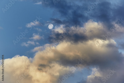 Clouds and moon at the morning sky