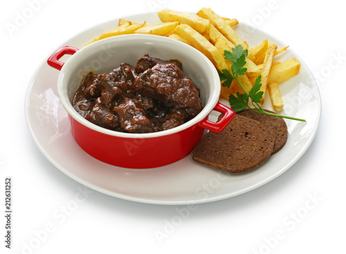 carbonade flamande with frites , flemish beef stew, belgian cuisine photo