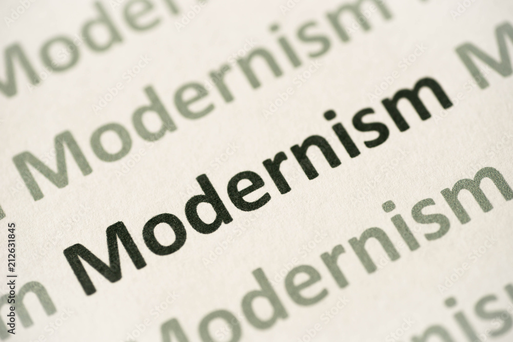 word Modernism printed on paper macro word Modernism printed on paper macro