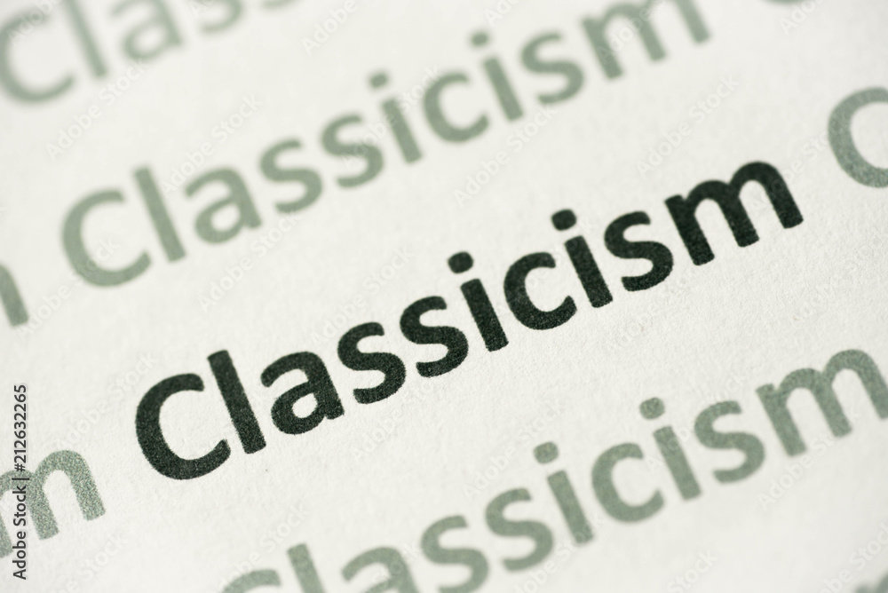 word Classicism printed on paper macro word Classicism printed on paper macro