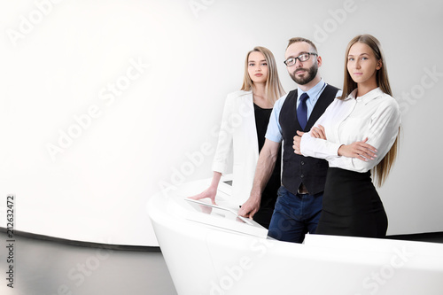 Team of business and office workers, close-up on a white background.