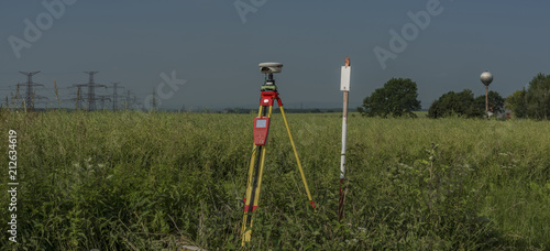 GPS tools in nettle field in hot summer © luzkovyvagon.cz