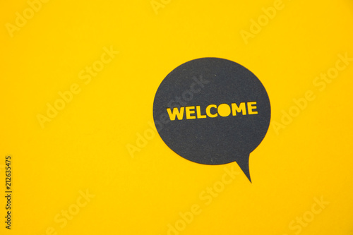 Speech bubble sticker with welcome. photo