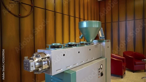 The process of working extrusion equipment.