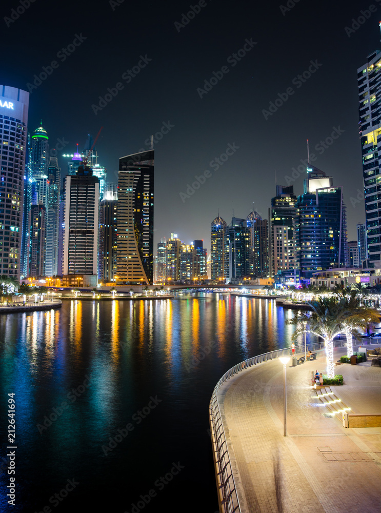 Fototapeta premium Dubai marina modern and shiny skyscrapers view at night