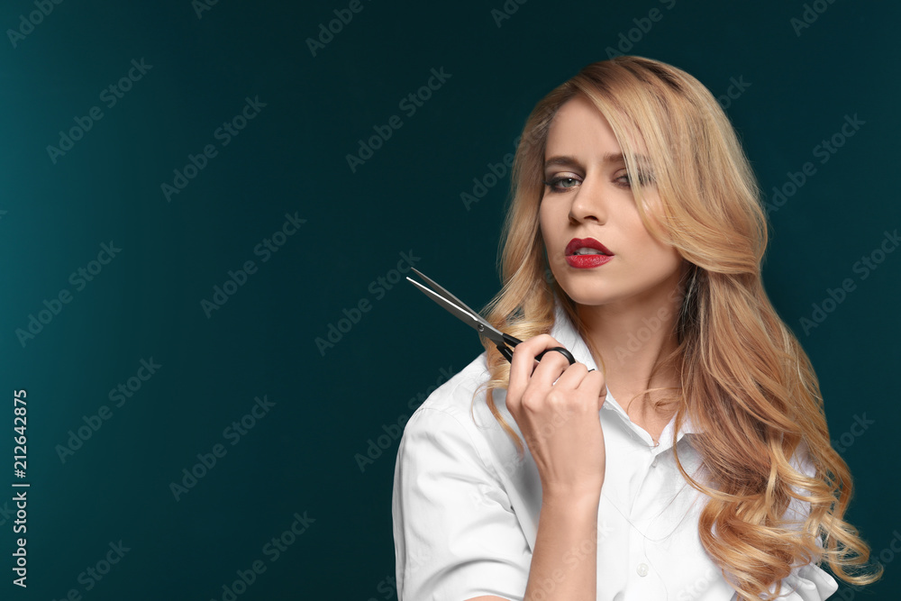 Professional hairdresser on color background Professional hairdresser on color background