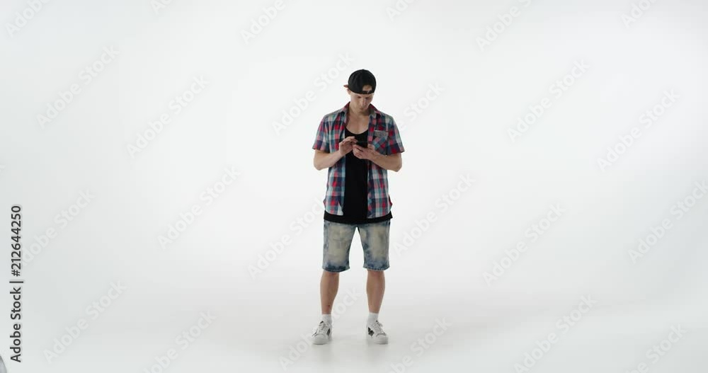 Man in casual dress using mobile phone. Man in casual dress using mobile phone.