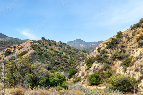 Blue sky over Southern California mountains on hot summer morning with room for text in blue sky
