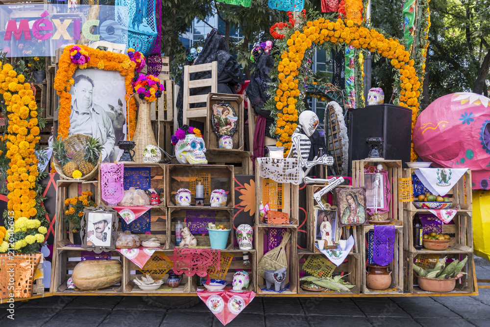 Naklejka premium Day of the Dead offering Colorful flowers and objects honoring the departed souls