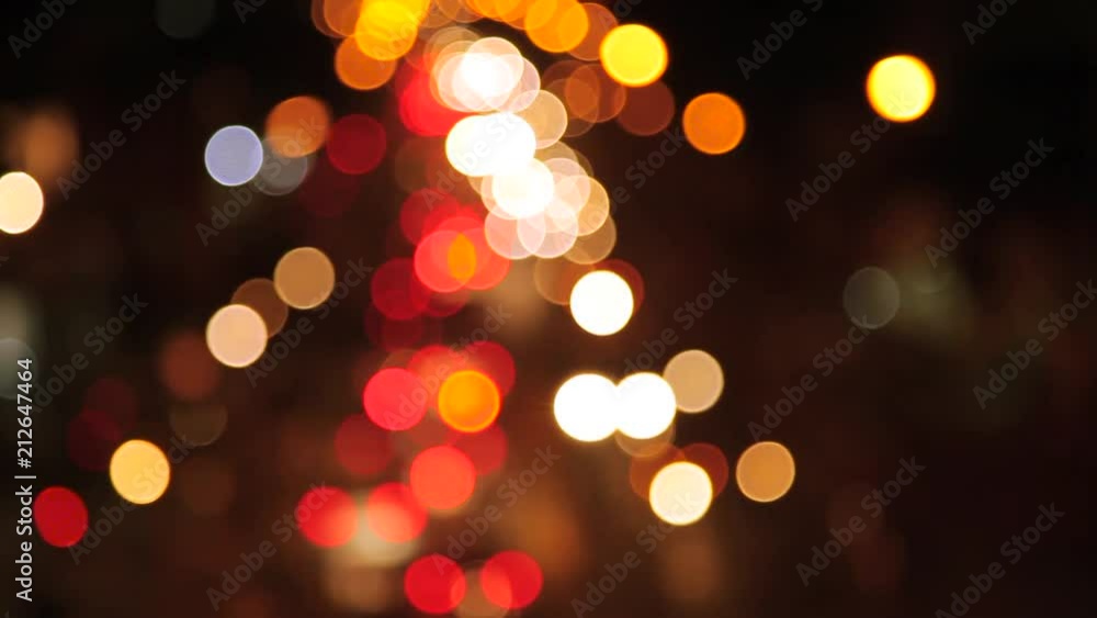 City at night background with cars. Out of focus background with blurry unfocused city lights. City at night background with cars. Out of focus background with blurry unfocused city lights.