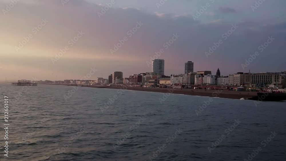 Brighton beach - Look at the city - Brighton beach - Couple sitting at the beach - 50% speed Brighton beach - Look at the city - Brighton beach - Couple sitting at the beach - 50% speed