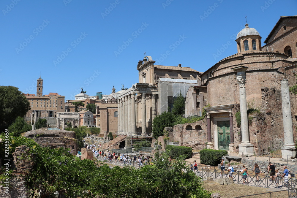 Street along Temple of Romulus and San Lorenzo in Miranda in Forum Romanum, Rome Italy 