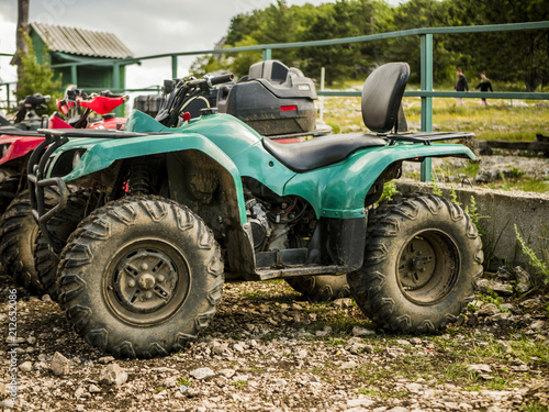 parked atv off road motor vehicle outdoor rainy day