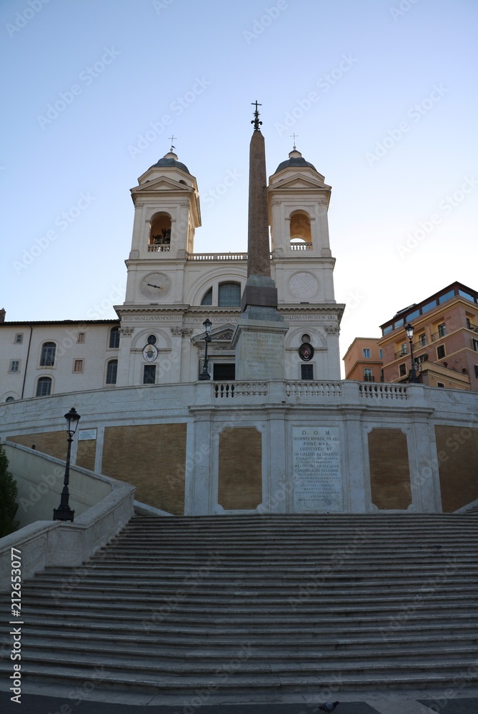 Church Santissima Trinità dei Monti at Spanish stairs at sunrise in Rome, Italy 