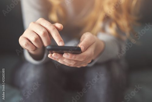 Girl looking at her phone
