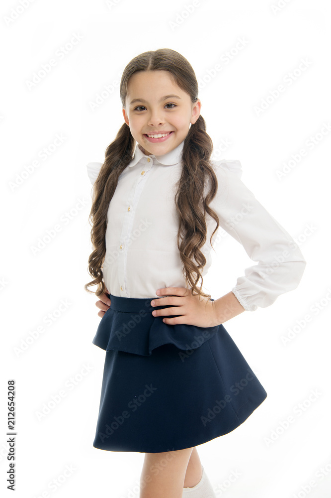 Little girl smile in school uniform isolated on white. Child smiling with long brunette hair. Fashion kid with stylish look. Beauty salon. Happy hair, happy you Little girl smile in school uniform isolated on white. Child smiling with long brunette hair. Fashion kid with stylish look. Beauty salon. Happy hair, happy you