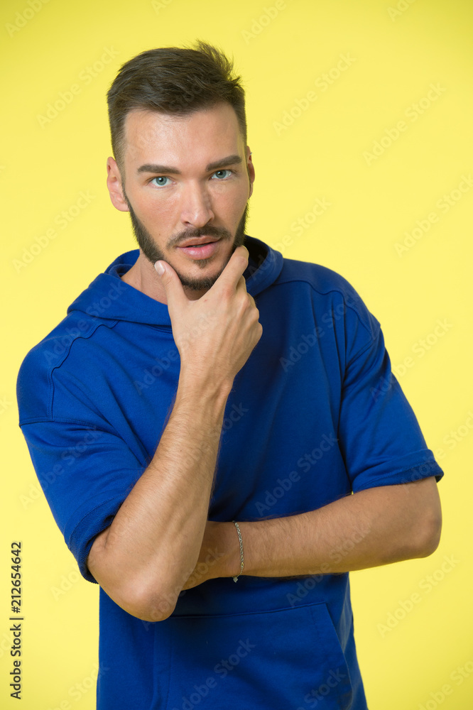 Is your beard as soft as my. Macho with smooth healthy skin and soft hair.  Man bearded confident face yellow background. Man bearded unshaven guy  looks handsome well groomed Stock Photo |