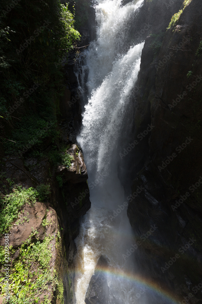 Fototapeta premium Waterfall at Iguazu falls with rainbow