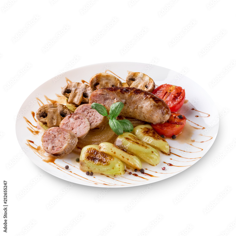 Roasted sausages with tomato sauce and vegetables on a white background Roasted sausages with tomato sauce and vegetables on a white background