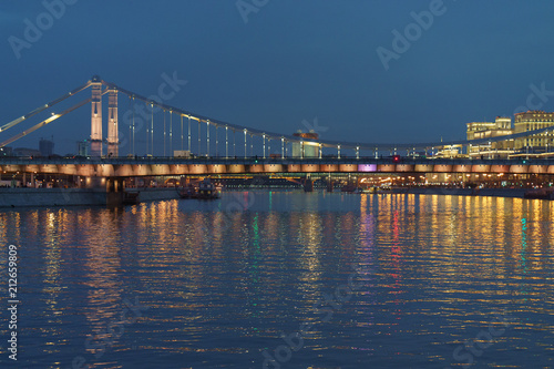 Brightly illuminated bridge at the sunset in Moscow © Yury and Tanya