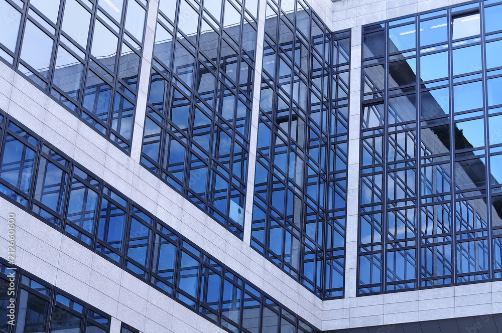 glass facade of an office building glass facade of an office building