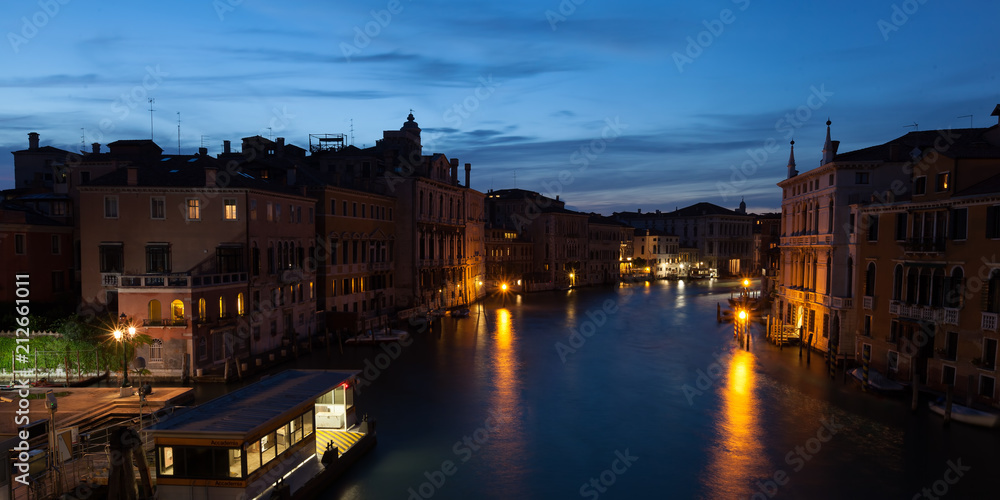 Evening sets on the Grand Canal in Venice Italy.