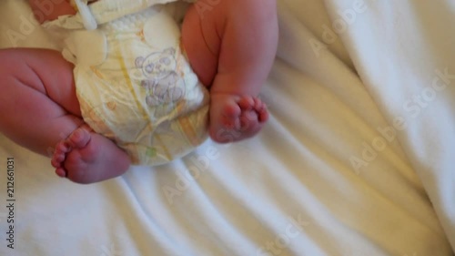Newborn New Baby in a Diaper. photo