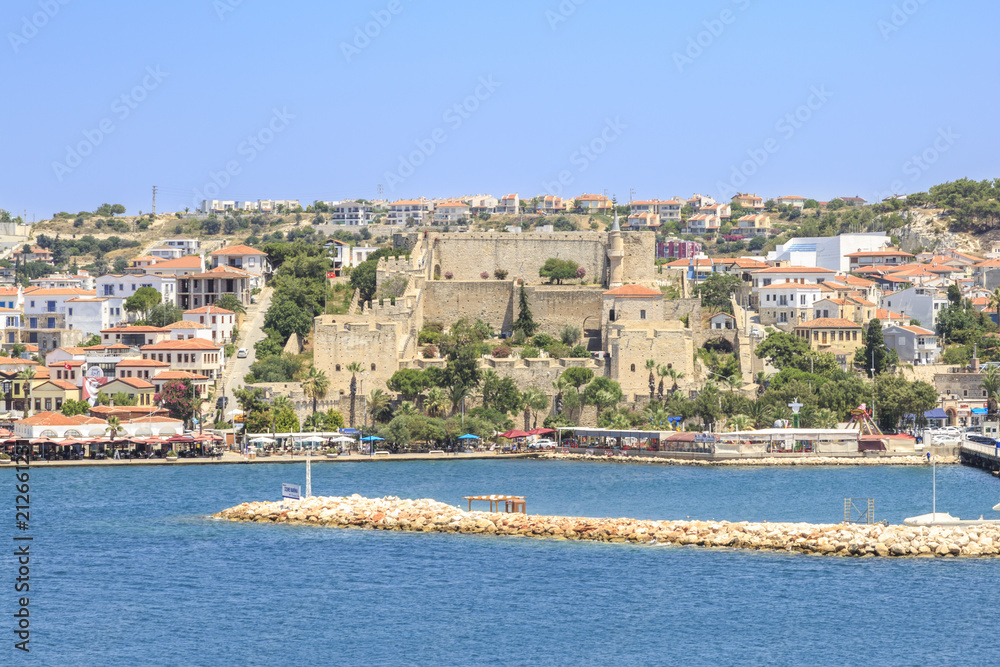 Cesme castle with marina area with small pier in Cesme, İzmir, Turkey
