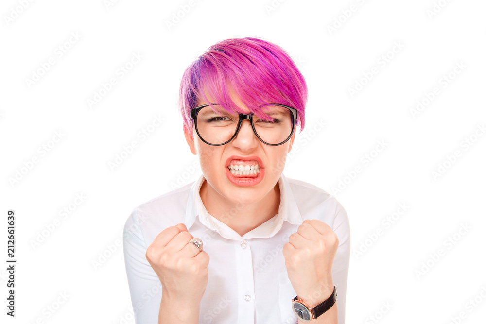 Mad woman with fists up grinning at camera