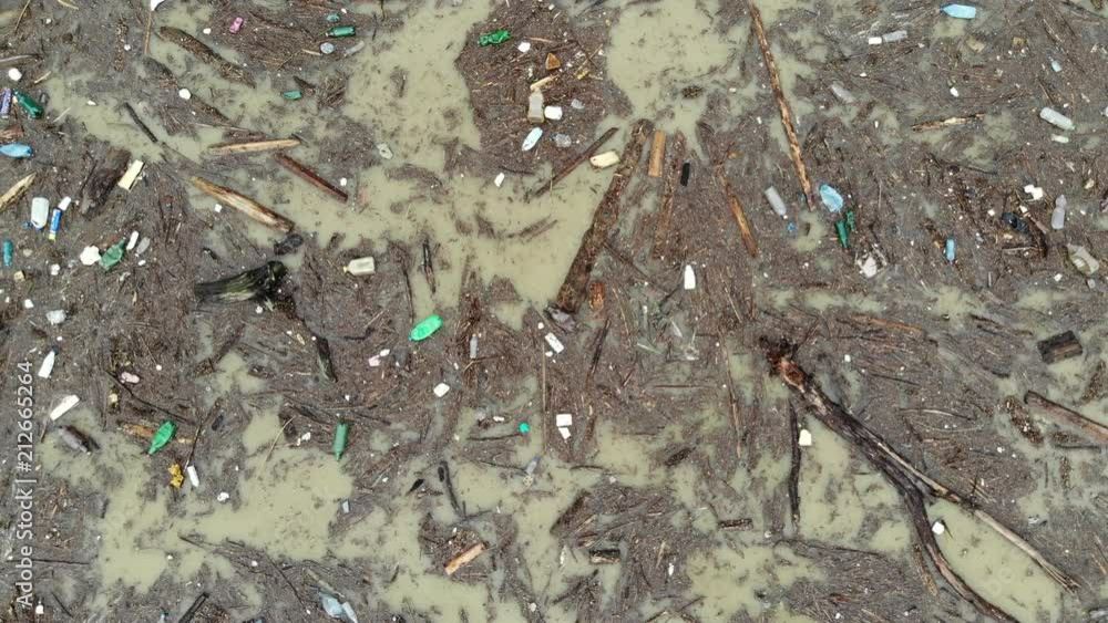 water pollution with plastic bags and dirt. aerial view of lake water pollution with plastic bags and dirt. aerial view of lake