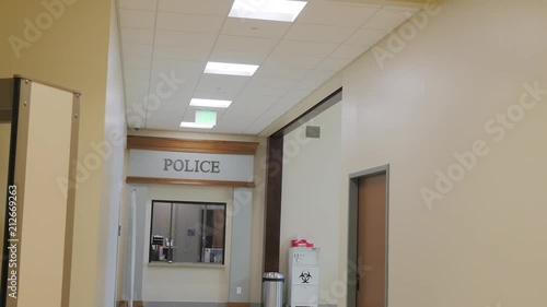 Pan Of Police Station Hallway