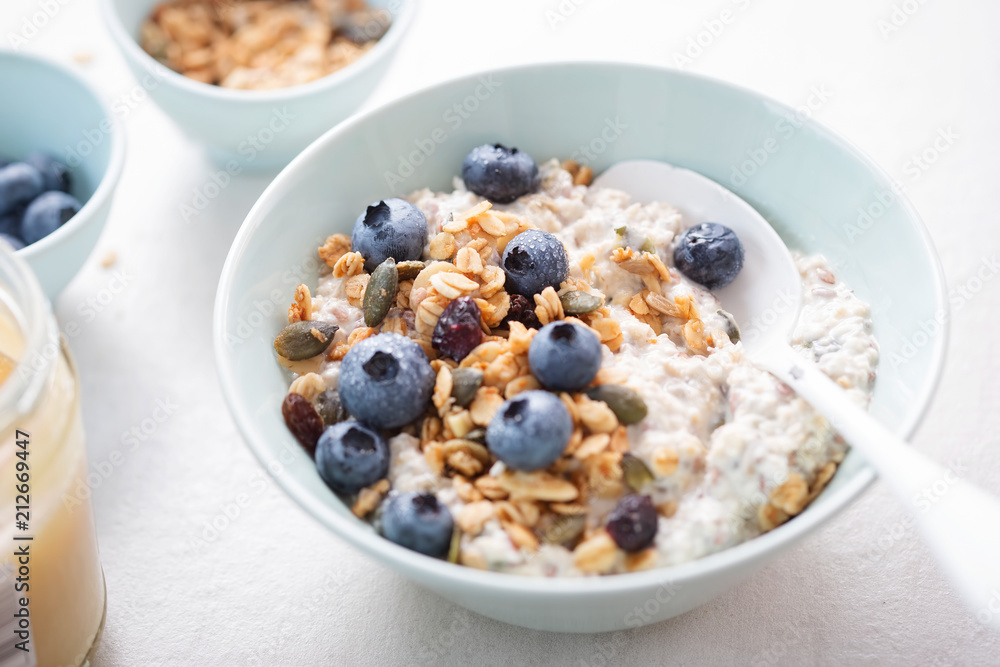 Oats with granola, dried cranberries, pumpkin seeds and blueberries Oats with granola, dried cranberries, pumpkin seeds and blueberries