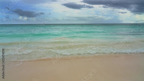 Beautiful ocean beach in dominican republic at stormy day photo