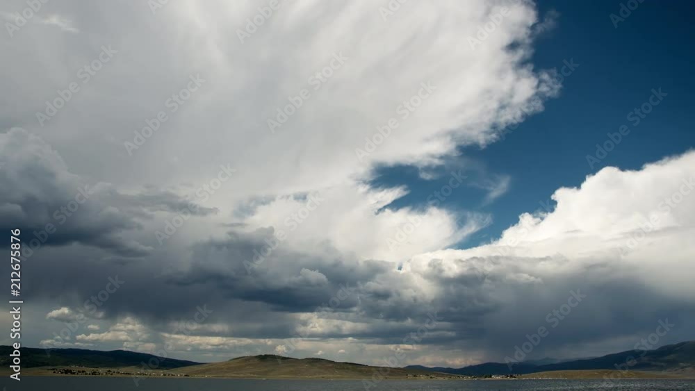 Timelapse of clouds over lake in wide open valley at Strawberry Reservoir, Utah. Timelapse of clouds over lake in wide open valley at Strawberry Reservoir, Utah.