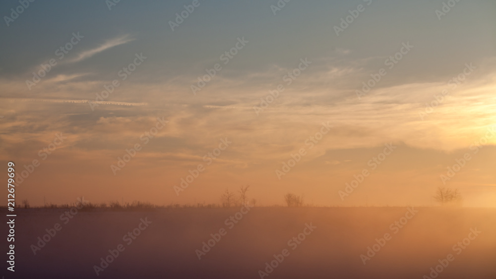 Countryside winter landscape at sunset
Countryside winter landscape at sunset