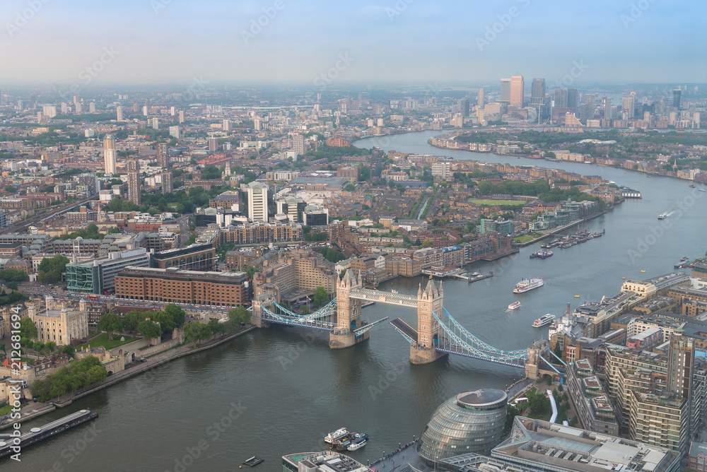 London city with Thames river and Tower Bridge at sunset, in United Kingdom