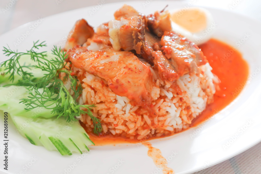 rice topped with pork and sauce