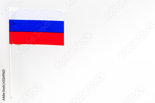Russian flag concept. Small flag on white background top view copy space Free Download Russian flag concept. Small flag on white background top view copy space - GFXLoad