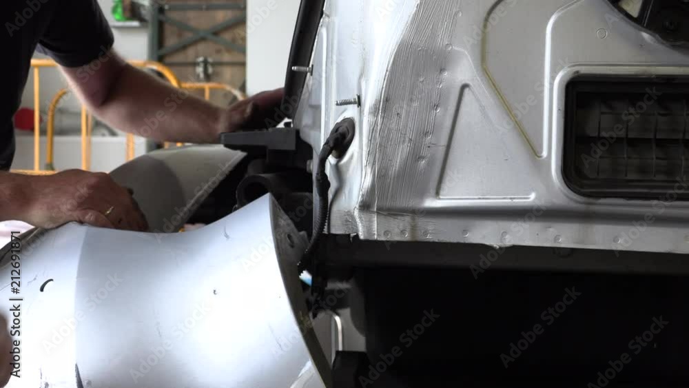 Appraiser checks that accident car Appraiser checks that accident car