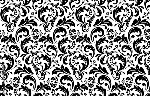 Flower pattern. Seamless white and black ornament. Graphic vector background. Ornament for fabric, wallpaper, packaging