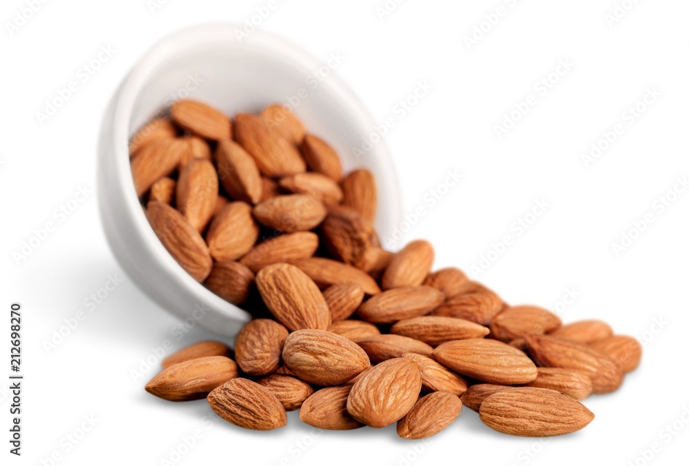 Bowl of almonds isolated on white background Bowl of almonds isolated on white background