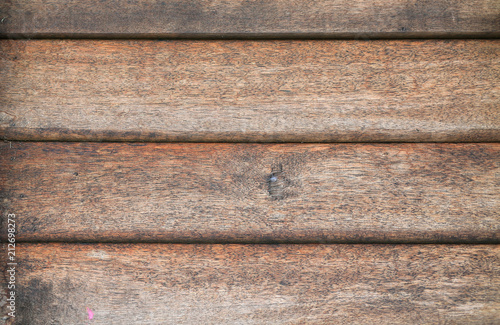 Old brown wood plank wall texture background.