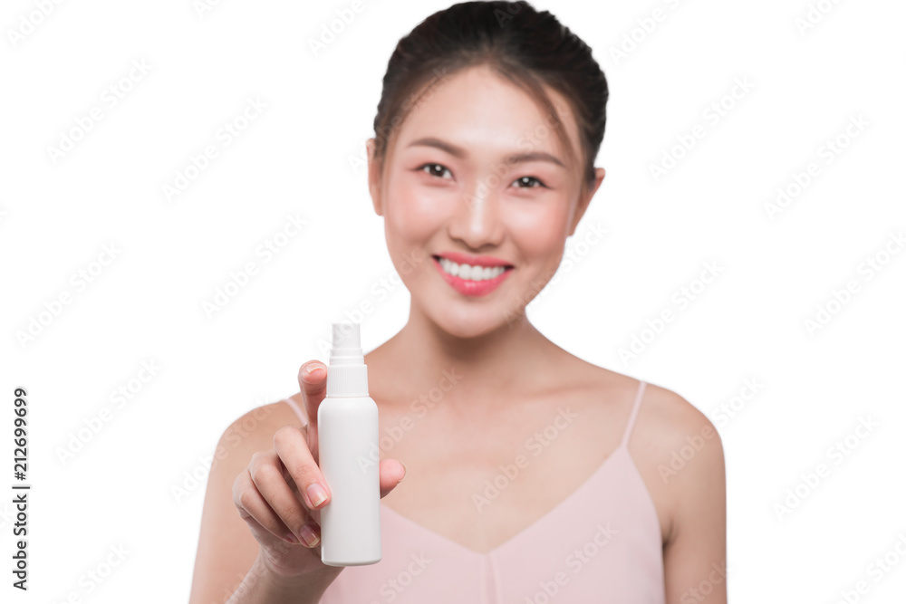 Beauty concept. Asian pretty woman with perfect skin holding cosmetic bottle Beauty concept. Asian pretty woman with perfect skin holding cosmetic bottle