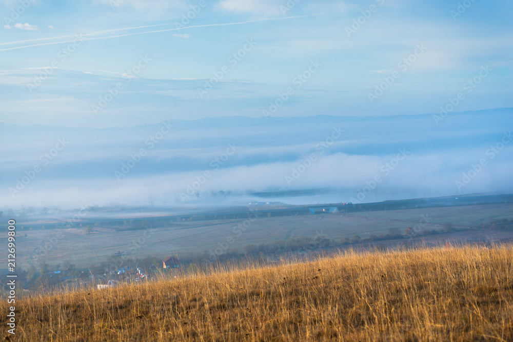 Obraz premium Morning fog in the autumn season