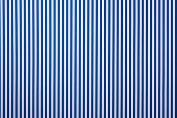 top view of white and blue striped surface for background